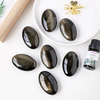 Golden Obsidian Palm Stone