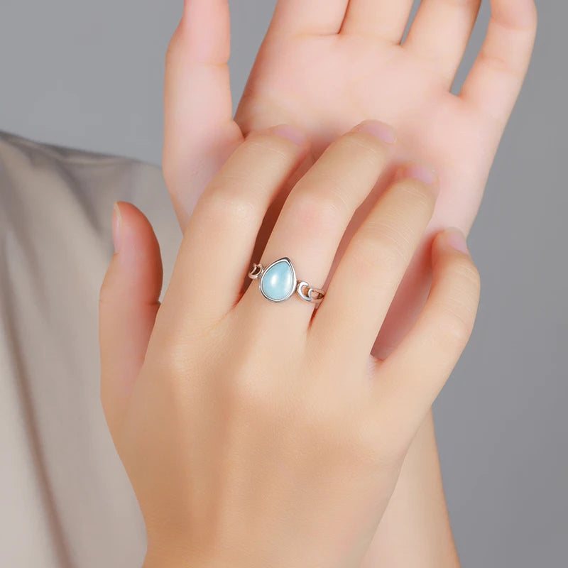 Larimar Pear Ring with Scrolled Silver Flourish