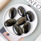 Golden Obsidian Palm Stone