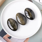 Golden Obsidian Palm Stone
