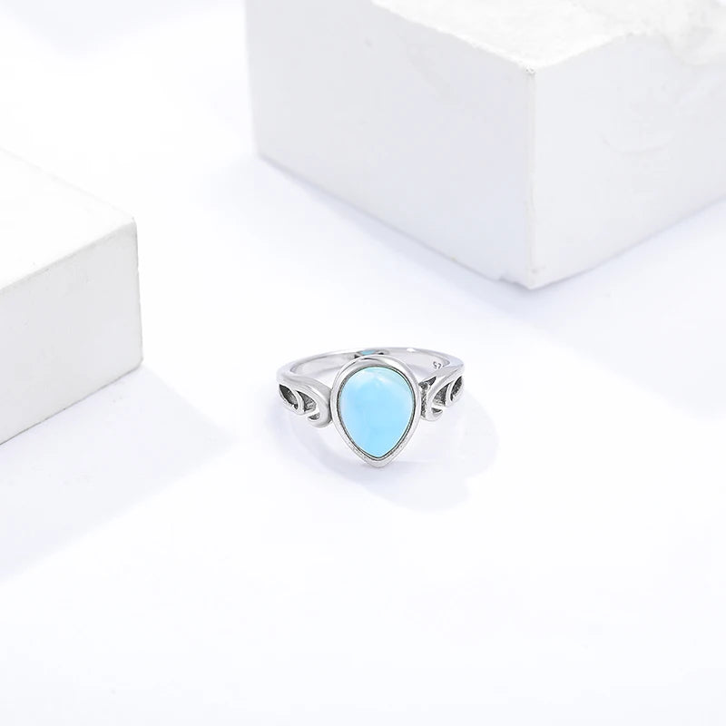 Larimar Pear Ring with Scrolled Silver Flourish