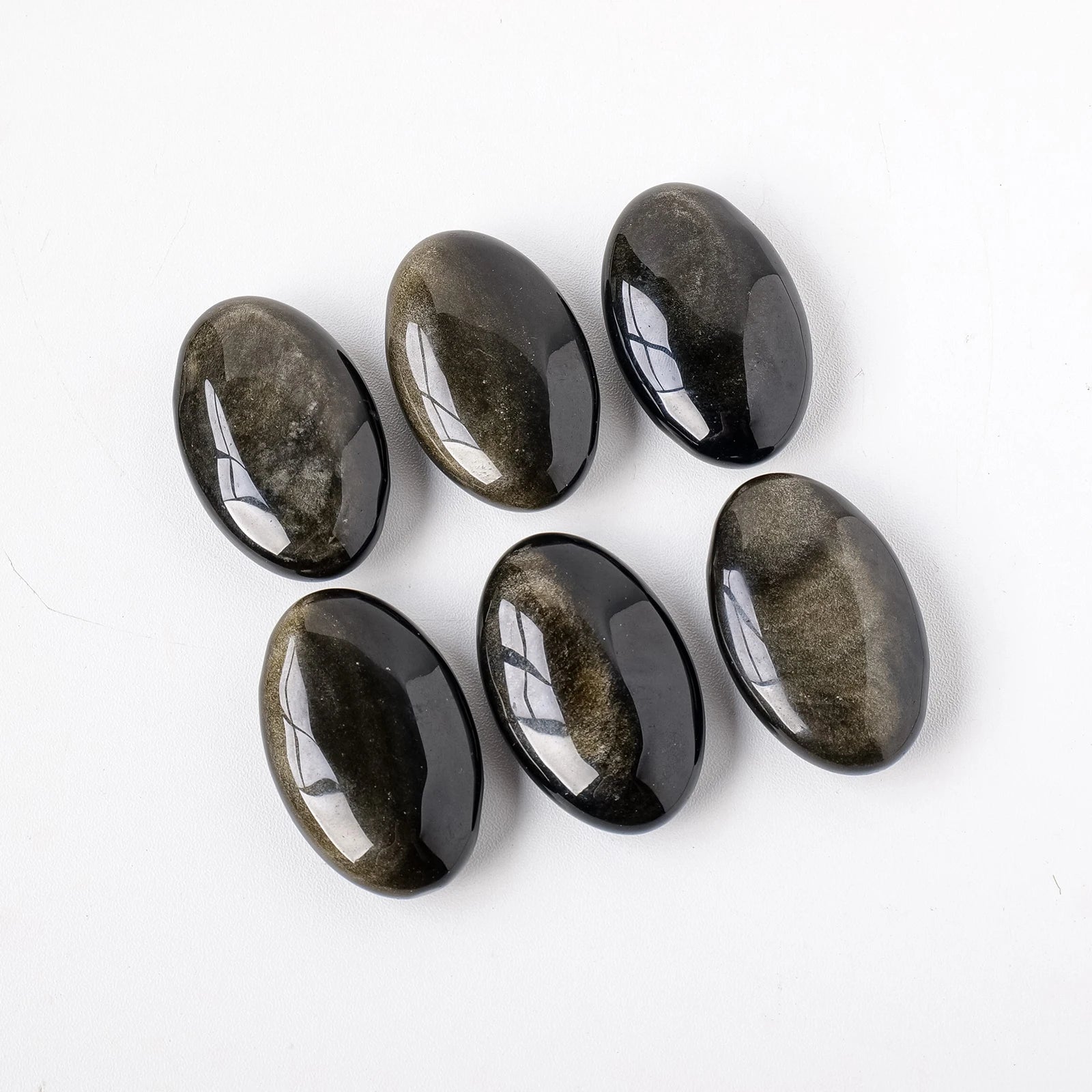 Golden Obsidian Palm Stone